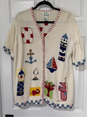 Coastalgrandma Cream Knit Cardigan with Red Trim and Multicolor Appliqués
